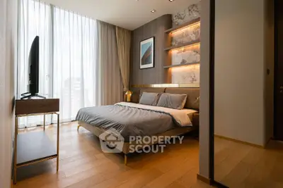 Luxurious modern bedroom with elegant decor and floor-to-ceiling windows.