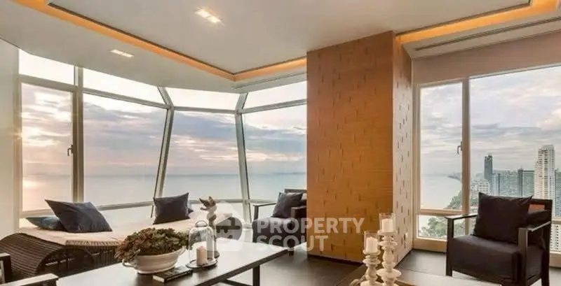 Luxurious living room with panoramic ocean view and modern decor