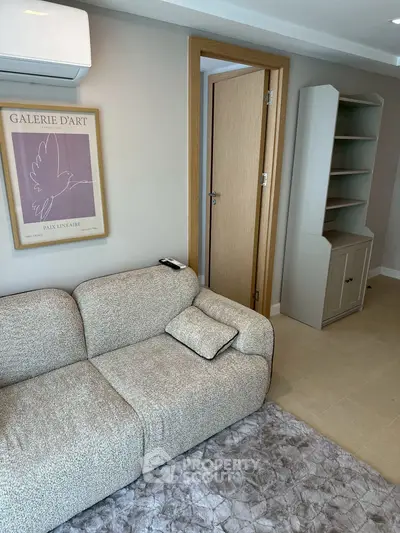 Modern living room with cozy sofa and stylish decor