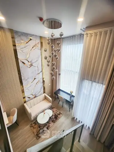 Luxurious modern living room with high ceilings and elegant decor