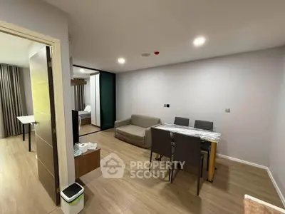 Modern living room with dining area in open layout apartment