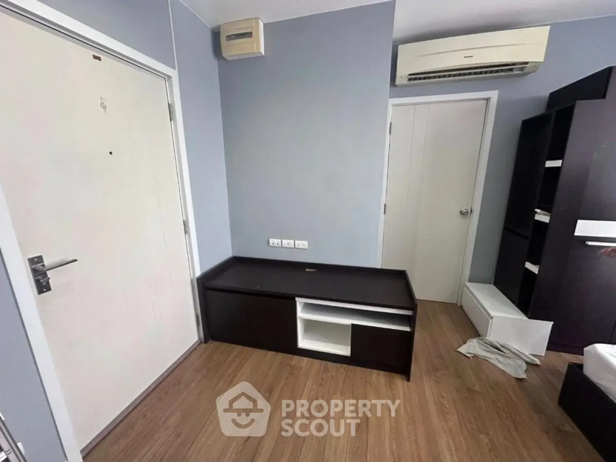 Modern interior with sleek furniture and air conditioning in a cozy living space.