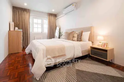 Cozy and elegant bedroom with modern decor and natural light