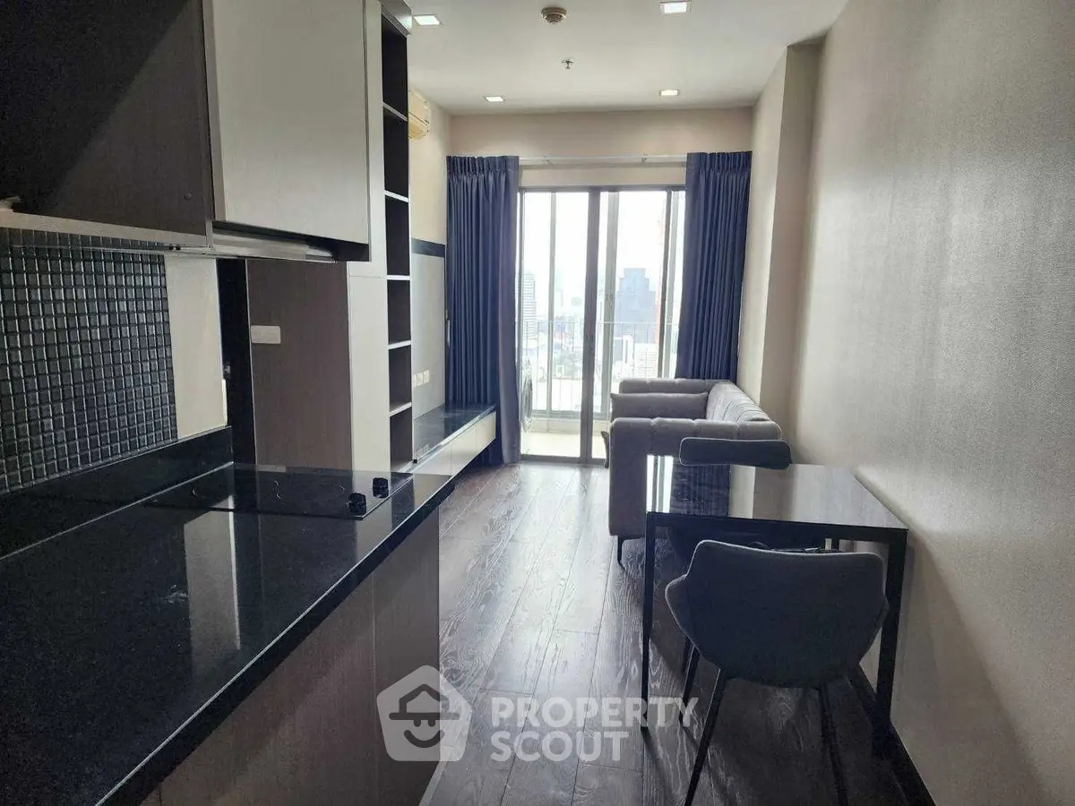 Modern apartment with open layout and city view from balcony