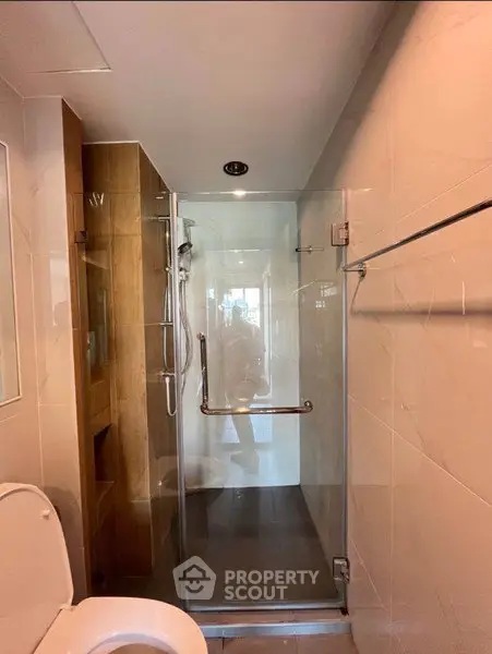 Modern bathroom with glass shower and sleek design