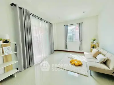 Bright and airy living room with modern decor and large windows