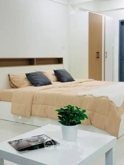 Modern bedroom with cozy bed and stylish decor