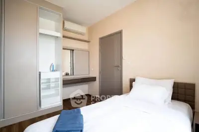 Modern bedroom with sleek design and ample storage space