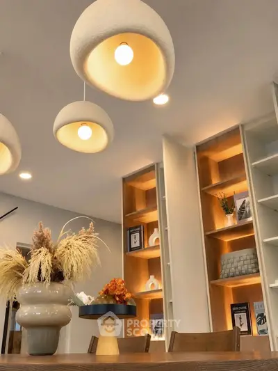 Modern living room with stylish lighting and elegant decor