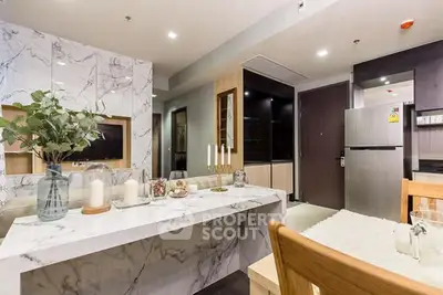 Luxurious modern kitchen with marble accents and sleek appliances