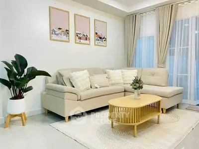 Stylish living room with modern decor and cozy beige sofa