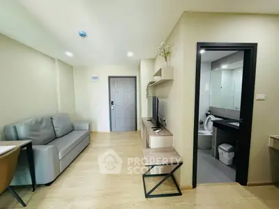 Modern living room with sleek design and open bathroom access