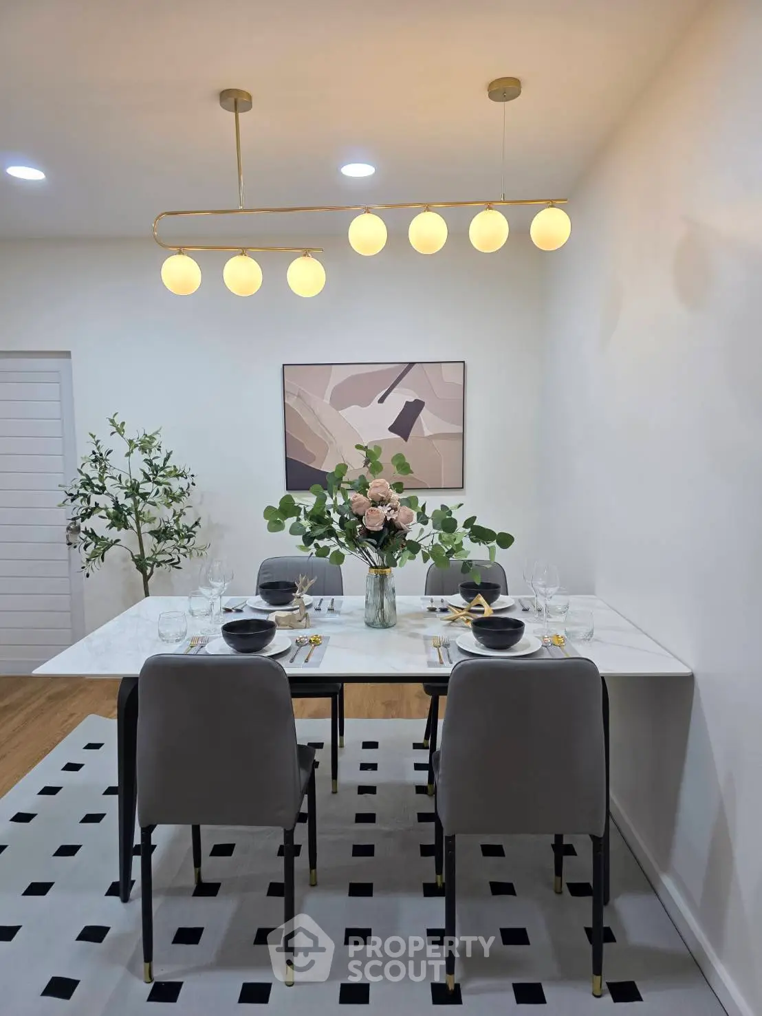 Elegant dining room with modern lighting and stylish decor