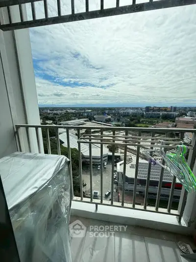 Stunning balcony view with expansive cityscape and horizon, perfect for relaxation.