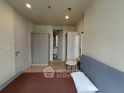 Modern bedroom with ensuite bathroom in a stylish apartment