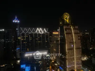 Stunning nighttime cityscape with illuminated skyscrapers showcasing modern architecture.