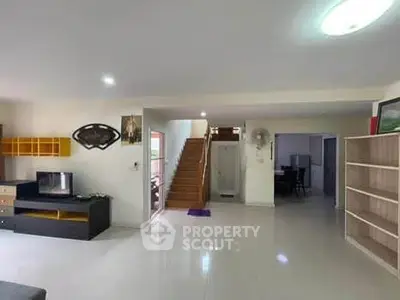 Spacious modern living room with sleek design and open layout