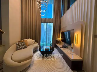 Luxurious modern living room with high ceilings and elegant decor