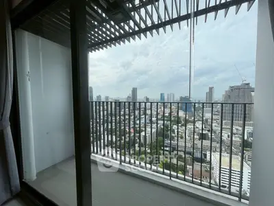 Stunning city view from a modern high-rise balcony, perfect for urban living.