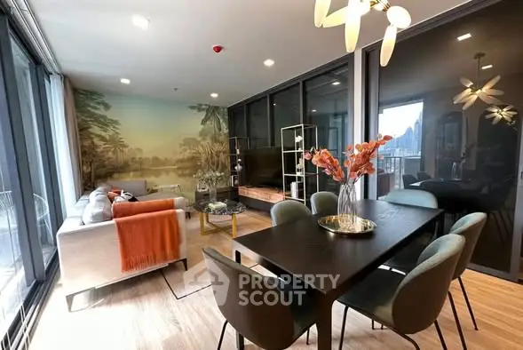 Luxurious modern living room with elegant dining area and scenic wall mural.