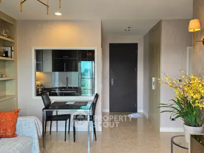 Modern living room with open kitchen and elegant decor