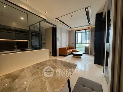 Modern open-layout living room with stylish kitchen and city view