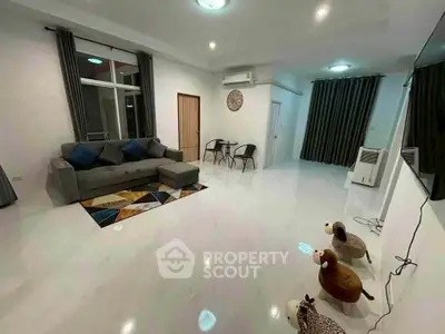 Spacious modern living room with sleek design and stylish furniture