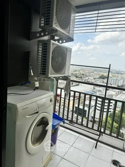 High-rise balcony with washing machine and city view, perfect for urban living.