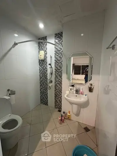 Modern bathroom with sleek tiles and contemporary fixtures