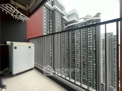 Modern high-rise balcony with cityscape view, perfect for urban living enthusiasts.