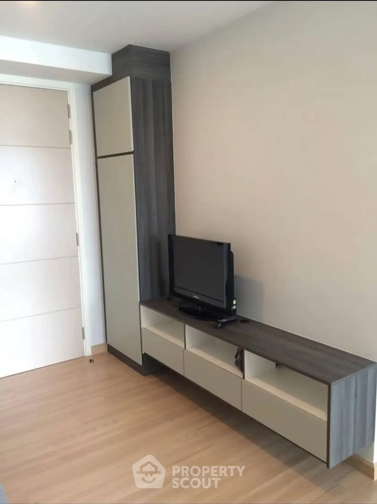 Modern living room with sleek TV unit and minimalist design