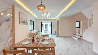 Spacious modern living room with elegant dining area and stylish lighting