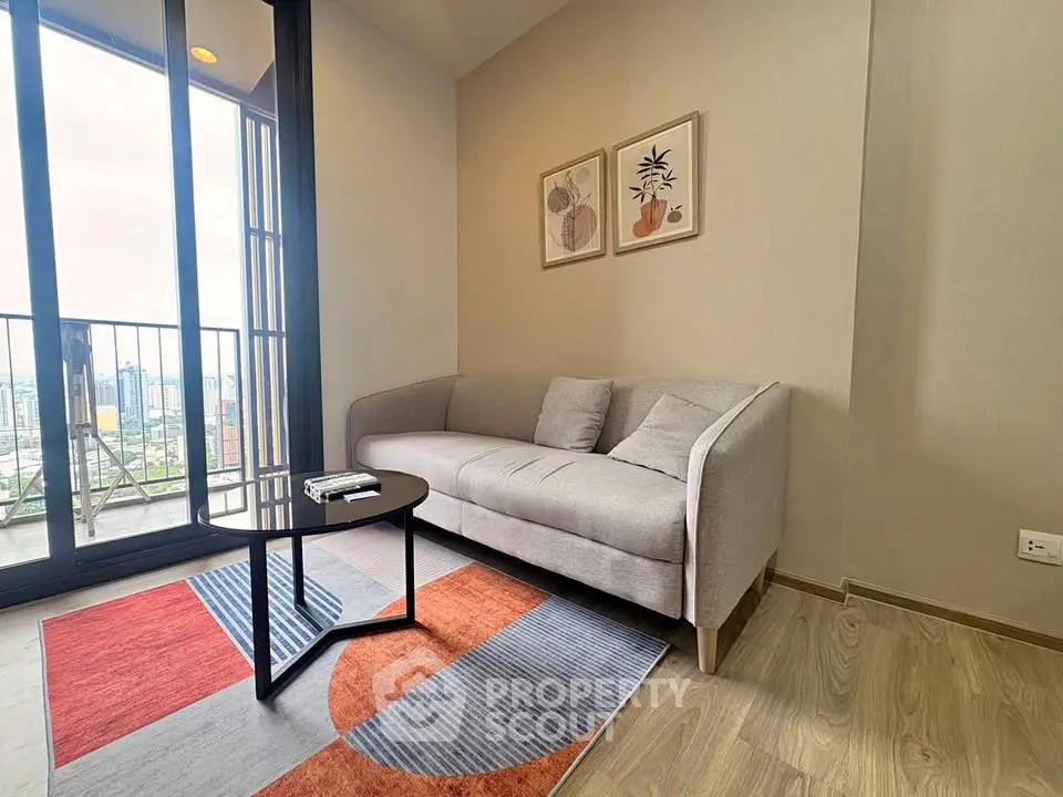 Modern living room with cozy sofa and city view balcony
