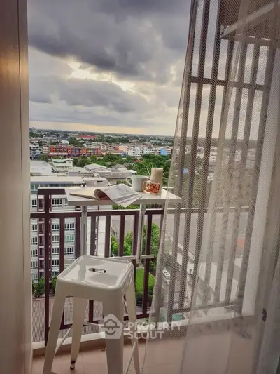 Charming balcony with stunning city view, perfect for relaxation and enjoying the skyline.