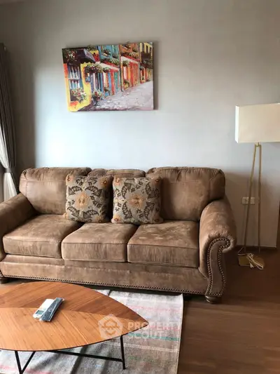 Cozy living room with plush brown sofa and stylish decor