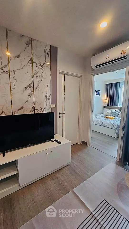Modern apartment interior with stylish living room and bedroom view