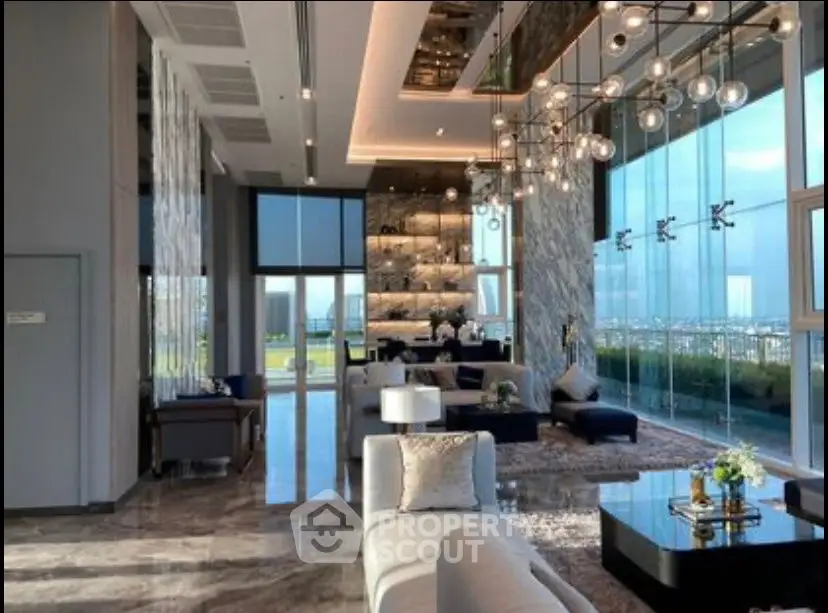 Luxurious modern living room with floor-to-ceiling windows and stunning city view.