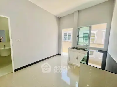 Bright modern kitchen with sleek design and ample natural light