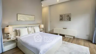 Elegant bedroom with modern decor and natural light