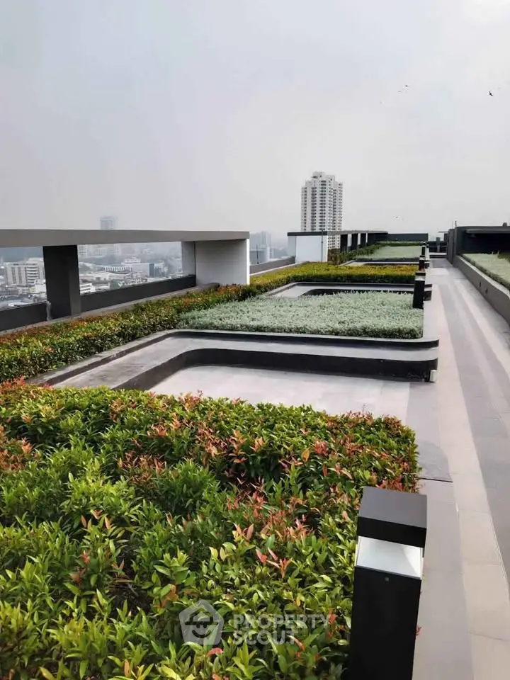 Stunning rooftop garden with panoramic city views, perfect for relaxation and entertainment.