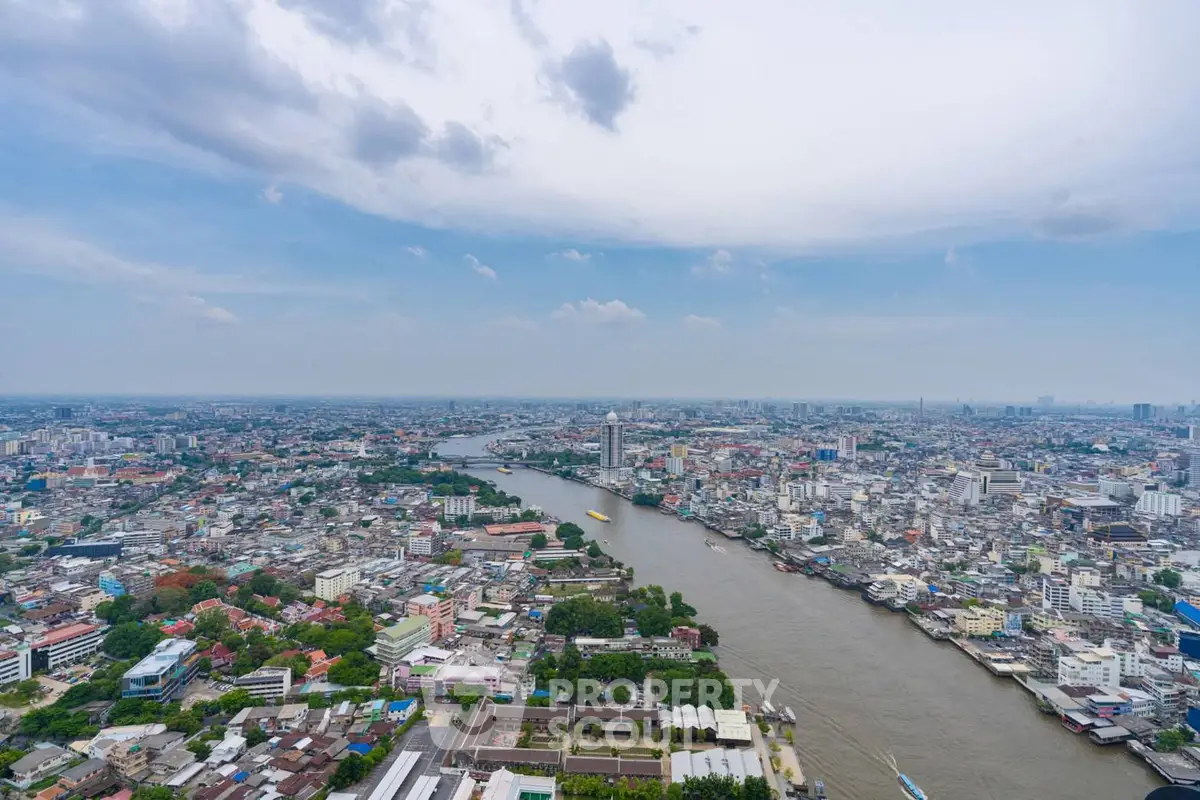 Stunning panoramic cityscape view with river, showcasing urban skyline and vibrant city life.