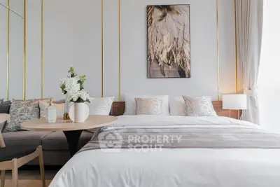 Luxurious bedroom with elegant decor and plush bedding