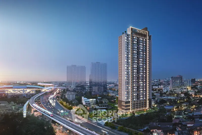 Stunning high-rise building with cityscape view at dusk, showcasing modern urban living.