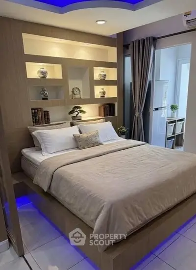 Modern bedroom with ambient lighting and stylish decor