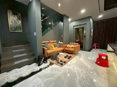 Luxurious modern living room with elegant decor and plush seating, perfect for relaxation and entertainment.