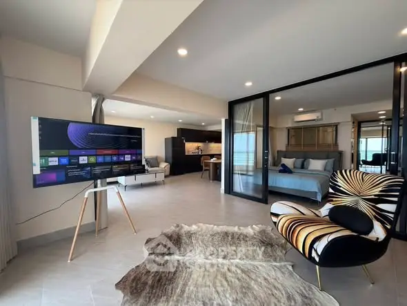 Luxurious open-plan living room with modern decor and stunning views