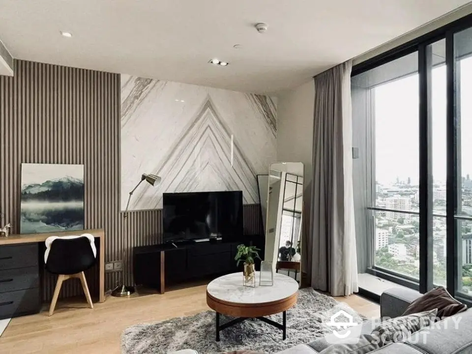 Modern living room with city view, stylish decor, and natural light.