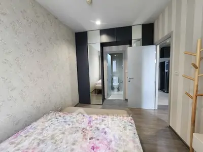 Modern bedroom with ensuite bathroom and stylish decor
