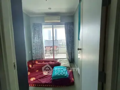 Cozy bedroom with balcony view in modern apartment