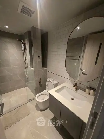 Modern bathroom with sleek design and spacious shower area